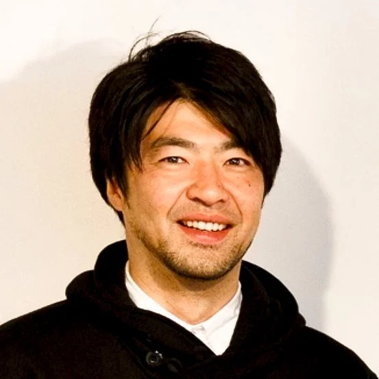 片山康之氏の笑顔のポートレート