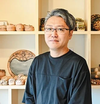 代表の田村健氏のポートレート